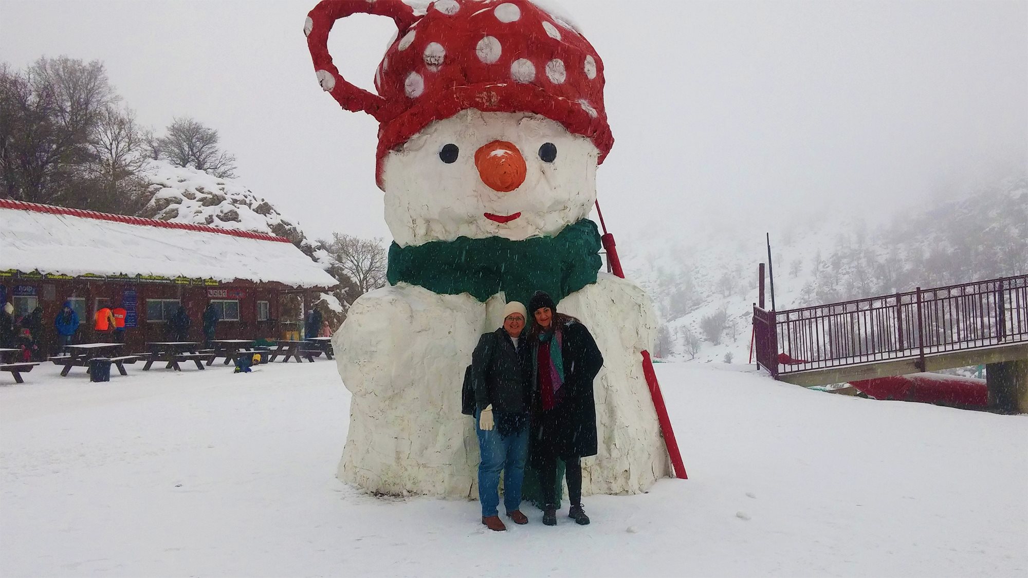 People Building A Snowman On An LDS Tour In Israel